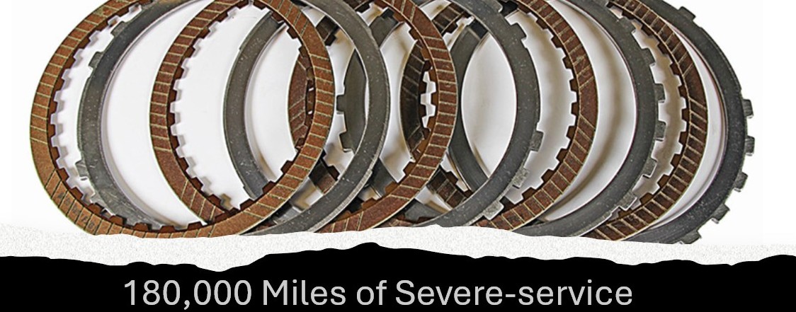 Synthetic transmission fluid protects clutch plates after 180,000 mile severe-service.